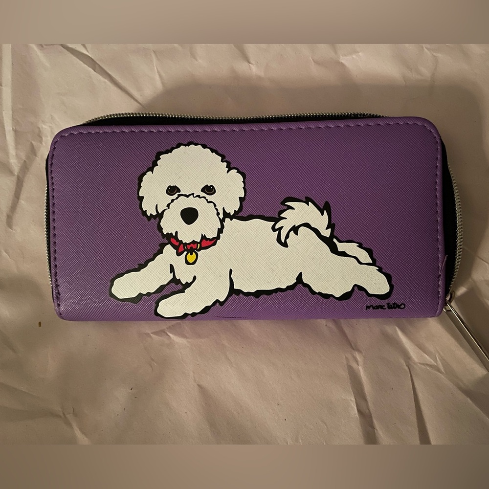 Marc Tetro purple hand clutch